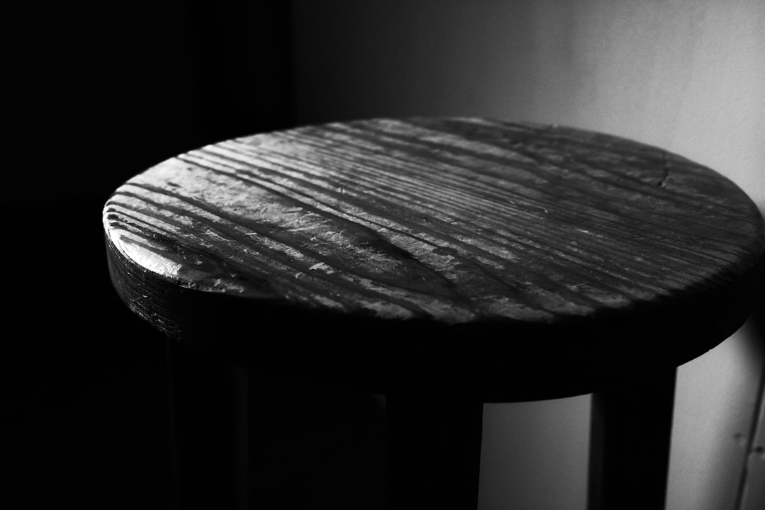 A black and white photo of a stool